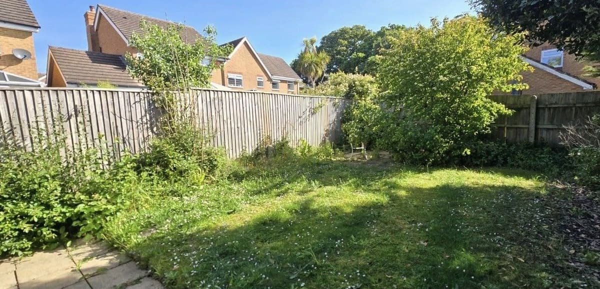 Before: garden presented for sale in Lymington