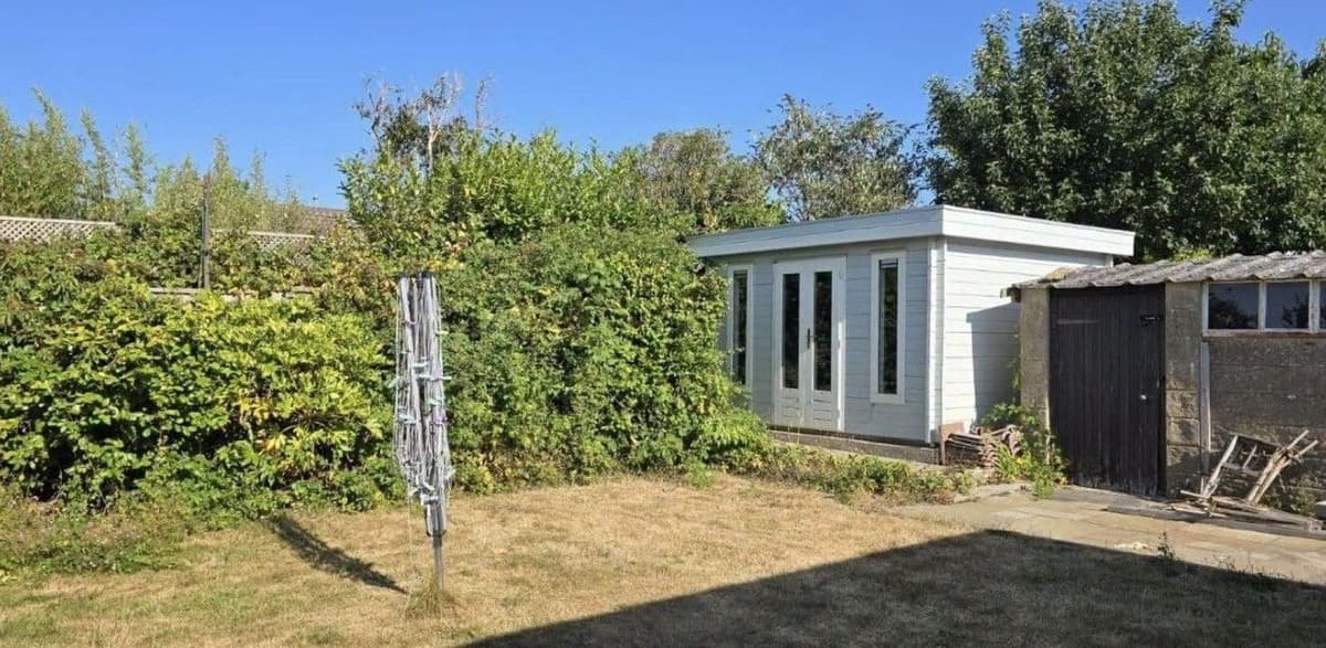 Before: garden room surroundings in Lymington