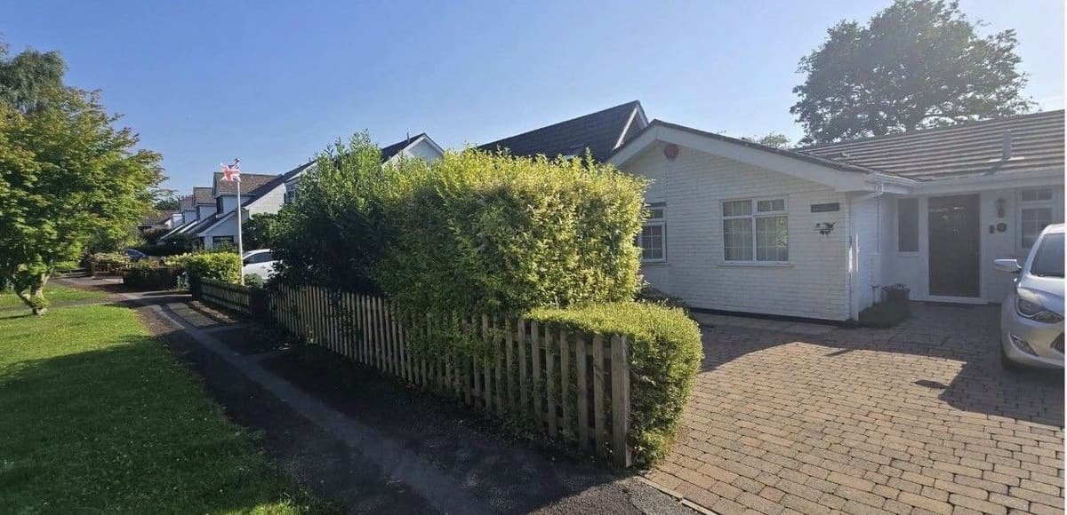 Before: shaped front hedge in Sway